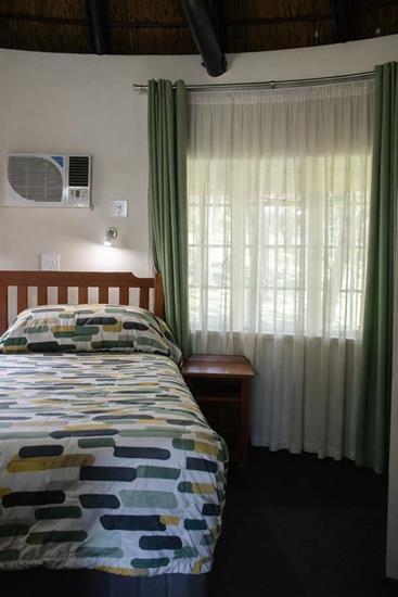 Badplaas, A Forever Resort: 4-Sleeper Rondavel. 2 bedrooms (1 double & 2 single rooms)