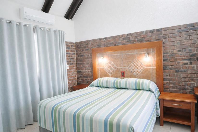 Badplaas, A Forever Resort: 4-Sleeper Chalet. 2 bedrooms (1 double bed & 2 single beds)